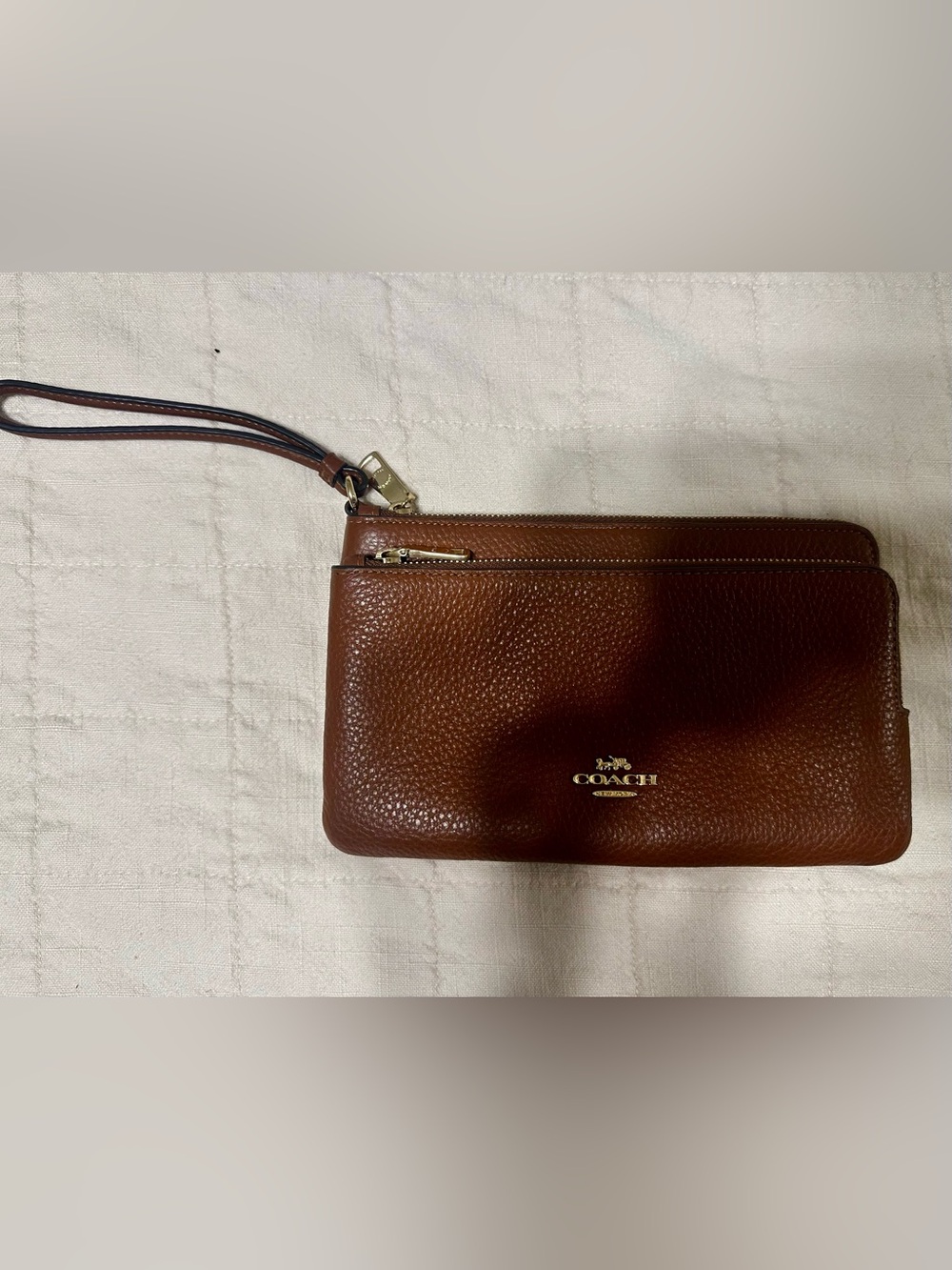 COACH Cognac Pebbled Leather Wristlet with Gold Hardware